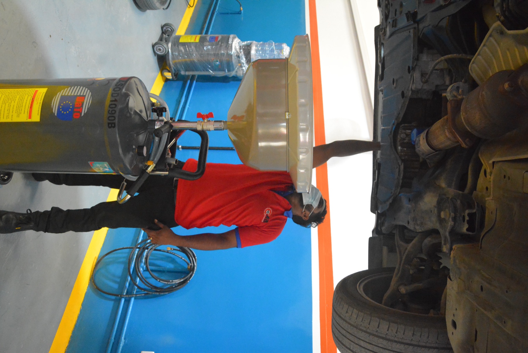Al Bedaya technician performing an oil service